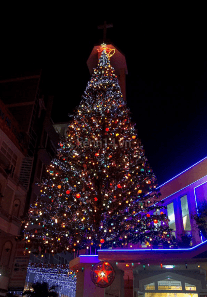 A giant Christmas tree is placed on top of An Nhon church