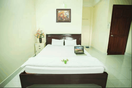 Thiết kế phòng ngủ sạch sẽ mà thoáng mát của khách sạn Dương Châu